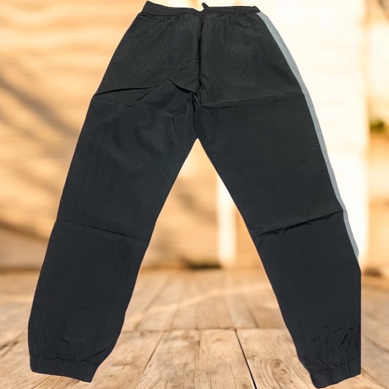 EVERLAST-男款風衣長褲 黑色  拼接 耐磨 保暖 運動 休閒 戶外 登山 健身 日常-細節圖3