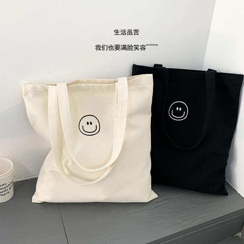 🎀【現貨+發票】韓版新款ins原宿微笑簡約可愛笑臉拉鍊帆布袋帆布包購物包肩背包單肩包側背包手提包手提袋購物袋文藝百搭-細節圖6