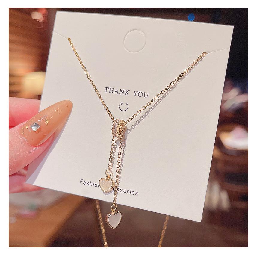 項鏈 頸鍊 韓版 鈦鋼 小橙子🍊 設計感 流蘇 雙愛心 項鍊 女網紅同款 個性氣質 桃心吊墜 鎖骨鏈 頸項鍊女 短項鍊女-細節圖2