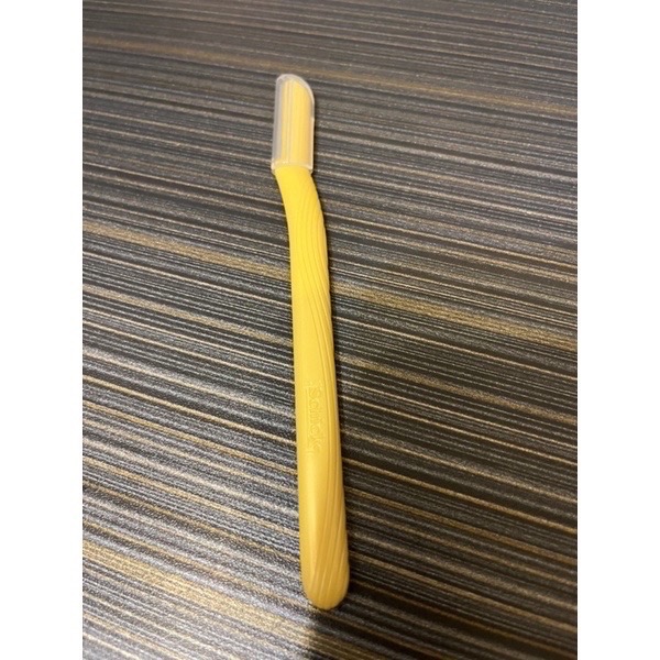 黃色臉部除毛刀