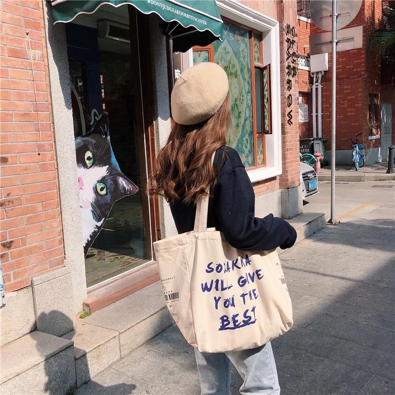 大容量塗鴉手寫風格帆布包慵懶風隨性單肩包側邊加寬日系肩背手提兩用布袋 百搭耐用 大學生適用 旅行外出必備磁扣閉合拉鍊內袋-細節圖3