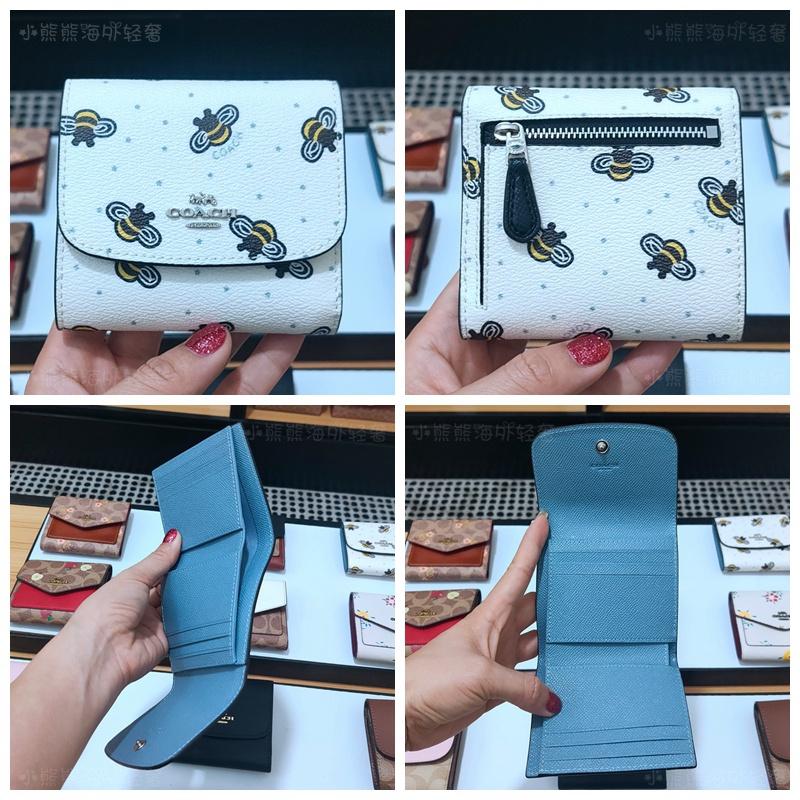 Coach bumble 2025 bee wallet