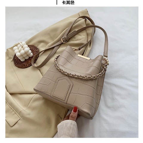 🖤現貨🖤 2022新款女手提小包包女潮復古女包春夏季洋氣石頭紋側背包斜挎水桶包女-細節圖9