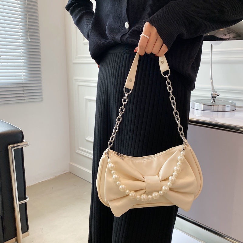 🖤Niche 設計蝴蝶結包 2021 新款夏季仙女珍珠手提包百褶側背包女包-細節圖9