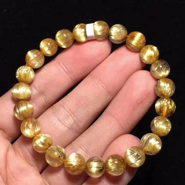 老礦天然鈦晶手鍊,顏色金黃,髮絲又閃又順,形成貓眼,性價比高鈦晶手排.女士精品天然鈦晶招財助事業(鈦晶.手排.招財.事業-細節圖2