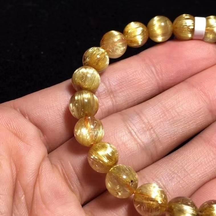 老礦天然鈦晶手鍊,顏色金黃,髮絲又閃又順,形成貓眼,性價比高鈦晶手排.女士精品天然鈦晶招財助事業(鈦晶.手排.招財.事業-細節圖3