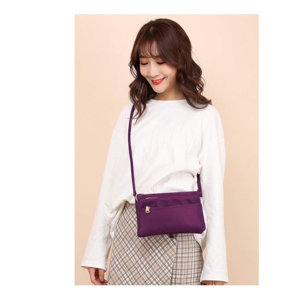 【iBoBo♡愛包包】現貨+預購 輕便休閒風 大容量多層多功能 手機零錢包 化妝包  斜跨包-細節圖7