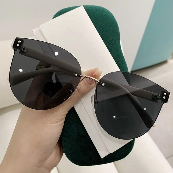 2025 現貨 新款時尚 無框橢圓 附贈眼鏡盒 無框女款 太陽眼鏡 抖音直播 海邊 女士墨镜 網紅同款 附贈眼鏡盒！-細節圖3