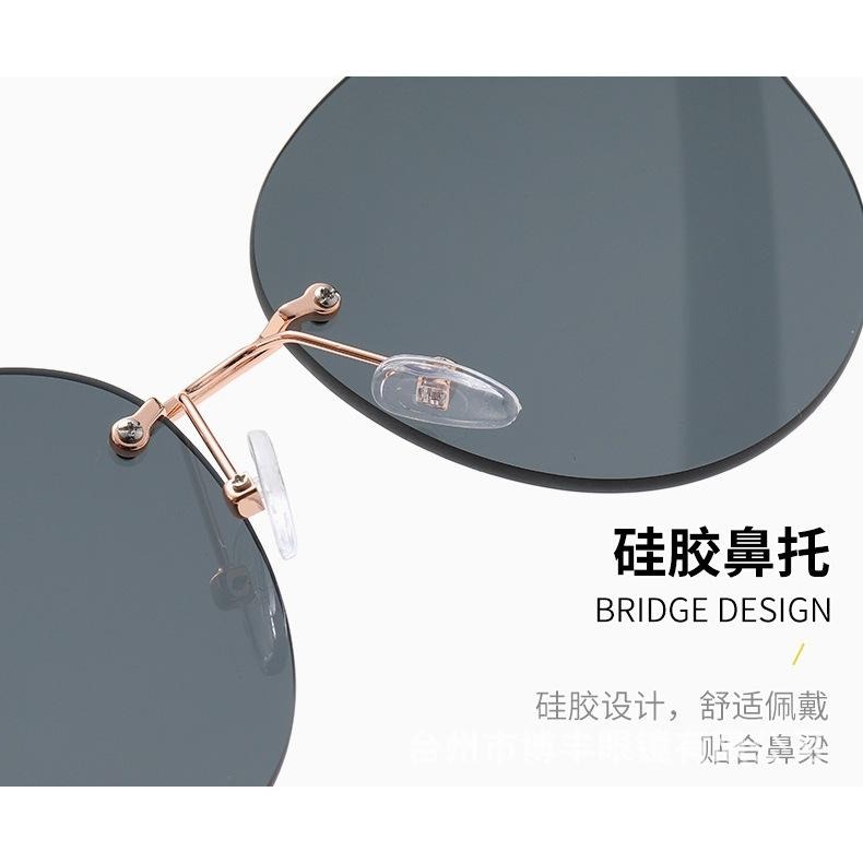 2025 現貨 新款時尚 無框橢圓 附贈眼鏡盒 無框女款 太陽眼鏡 抖音直播 海邊 女士墨镜 網紅同款 附贈眼鏡盒！-細節圖7