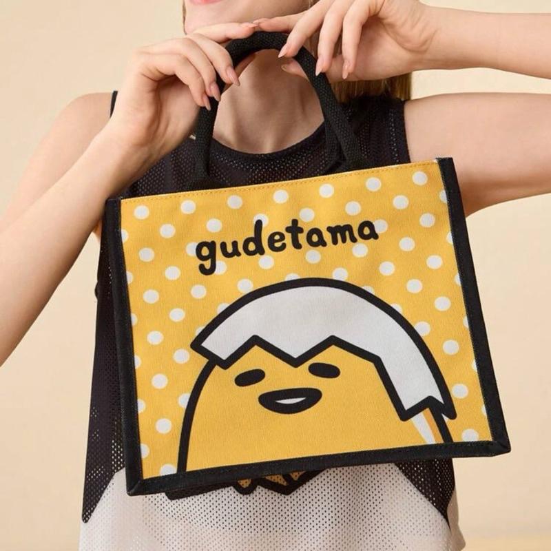 正版聯名 蛋黃哥 Gudetama 黃色卡通圖案手提包 手提托特包 便當包-細節圖2