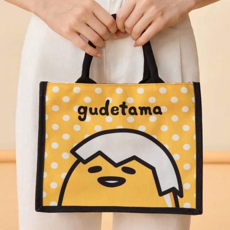 正版聯名 蛋黃哥 Gudetama 黃色卡通圖案手提包 手提托特包 便當包-細節圖6