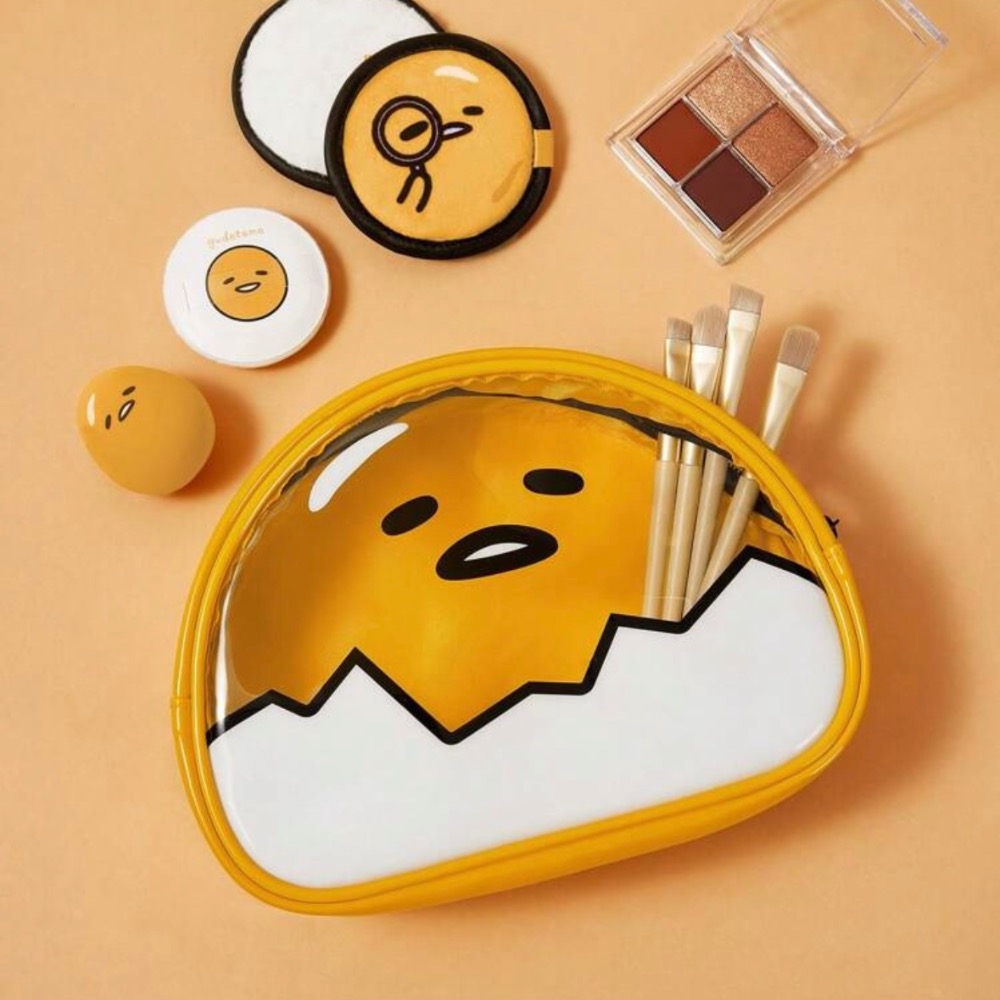 正版聯名 蛋黃哥 Gudetama 黃色卡通滿版圖案透明化妝包 化妝收納包-細節圖6