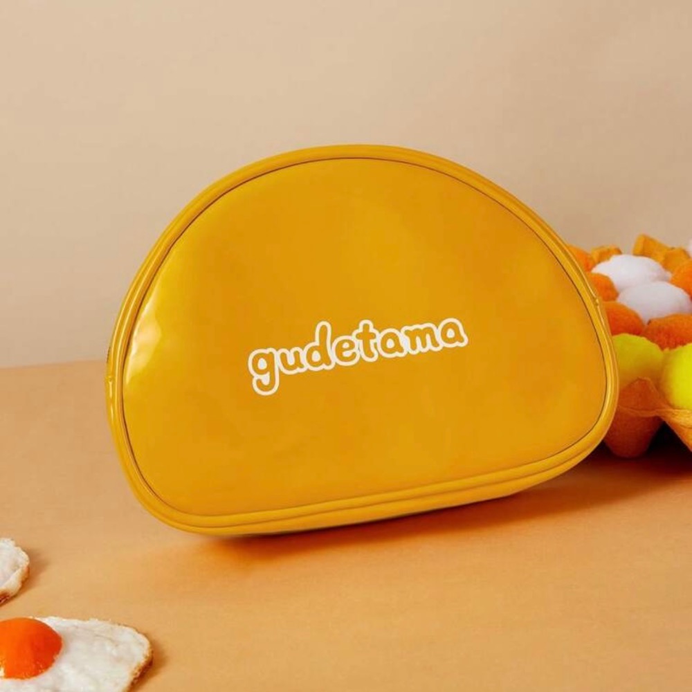 正版聯名 蛋黃哥 Gudetama 黃色卡通滿版圖案透明化妝包 化妝收納包-細節圖8