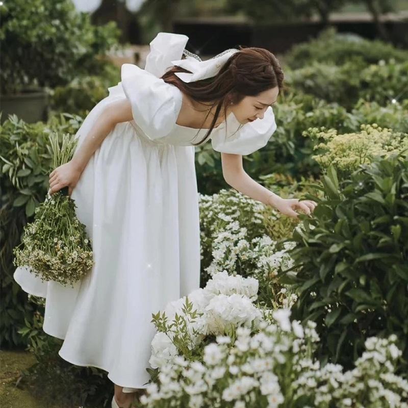 旗艦店法式輕婚紗2023新款氣質緞面泡泡袖露背公主風白色小禮服平時可穿-細節圖3