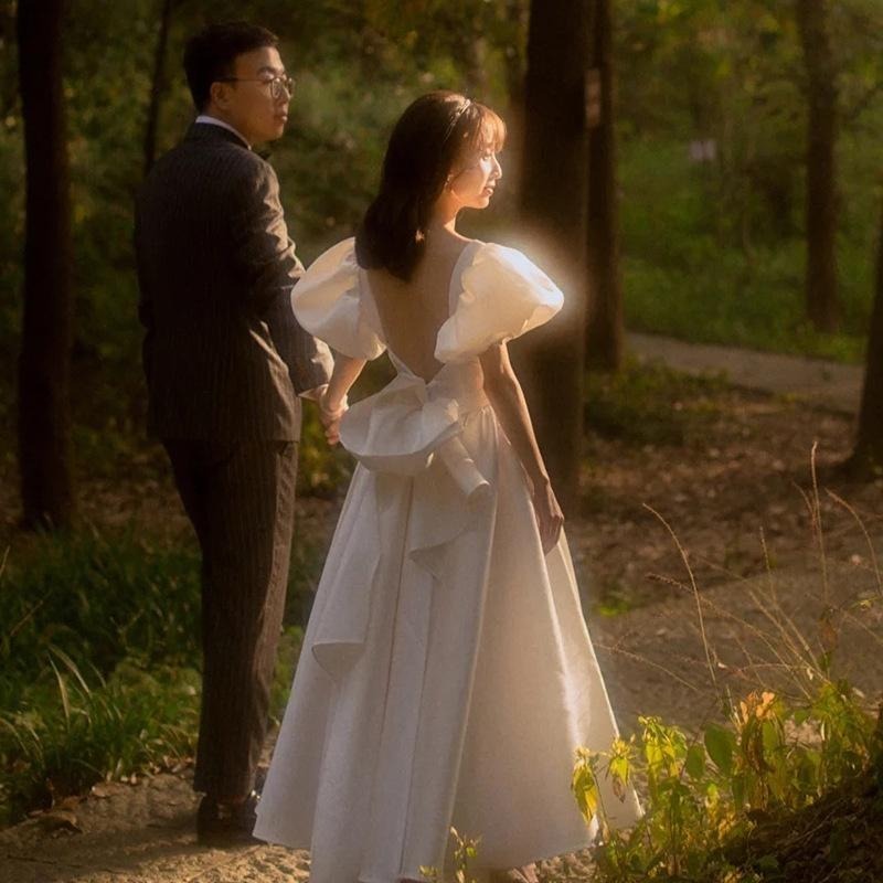 旗艦店法式輕婚紗2023新款氣質緞面泡泡袖露背公主風白色小禮服平時可穿-細節圖4