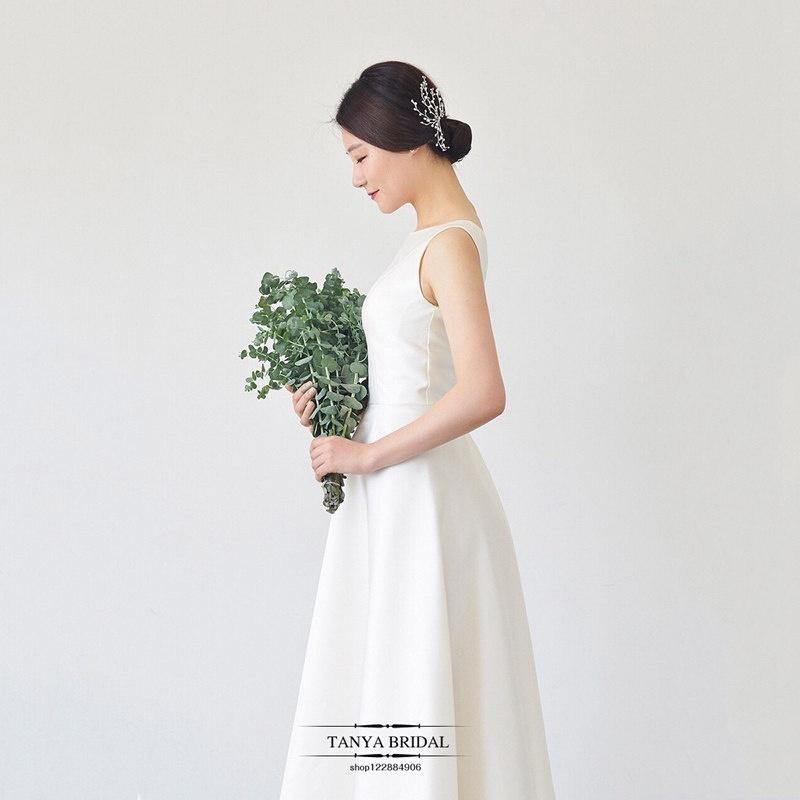 旗艦店緞面輕婚紗2023新款韓式新娘一字肩白色簡約齊地森系婚禮旅拍春季-細節圖4