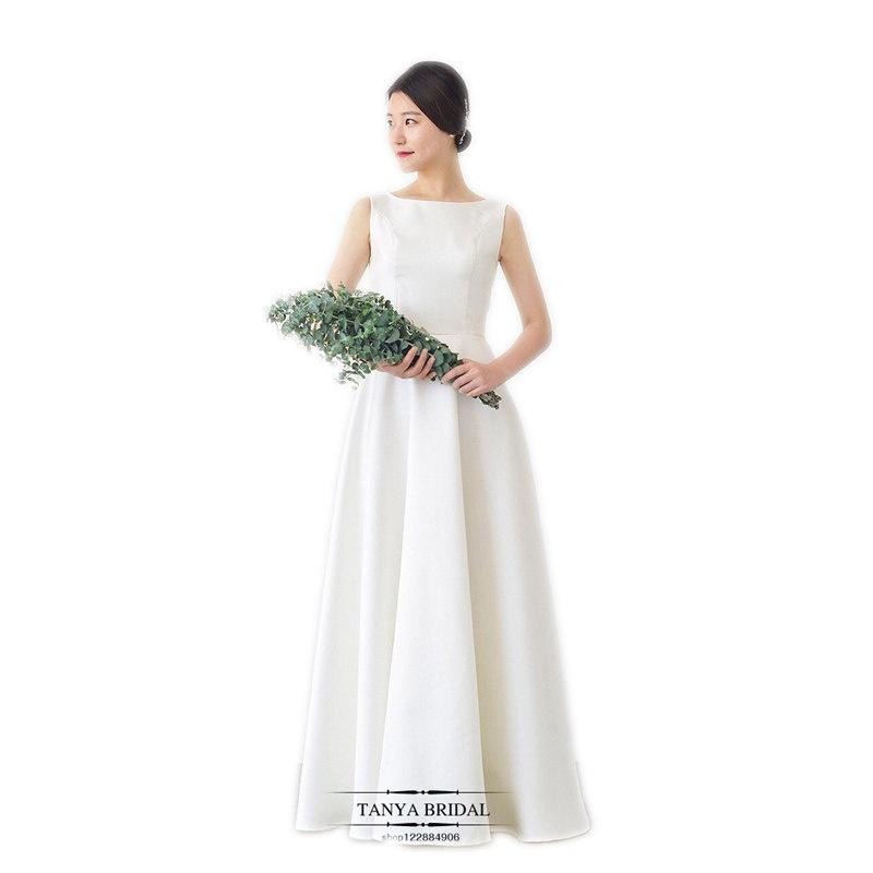 旗艦店緞面輕婚紗2023新款韓式新娘一字肩白色簡約齊地森系婚禮旅拍春季-細節圖5