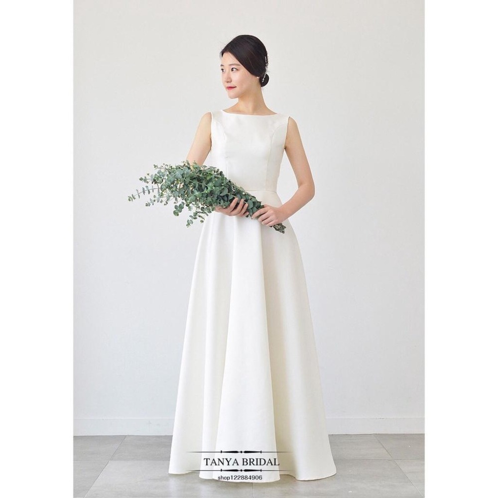 旗艦店緞面輕婚紗2023新款韓式新娘一字肩白色簡約齊地森系婚禮旅拍春季-細節圖7