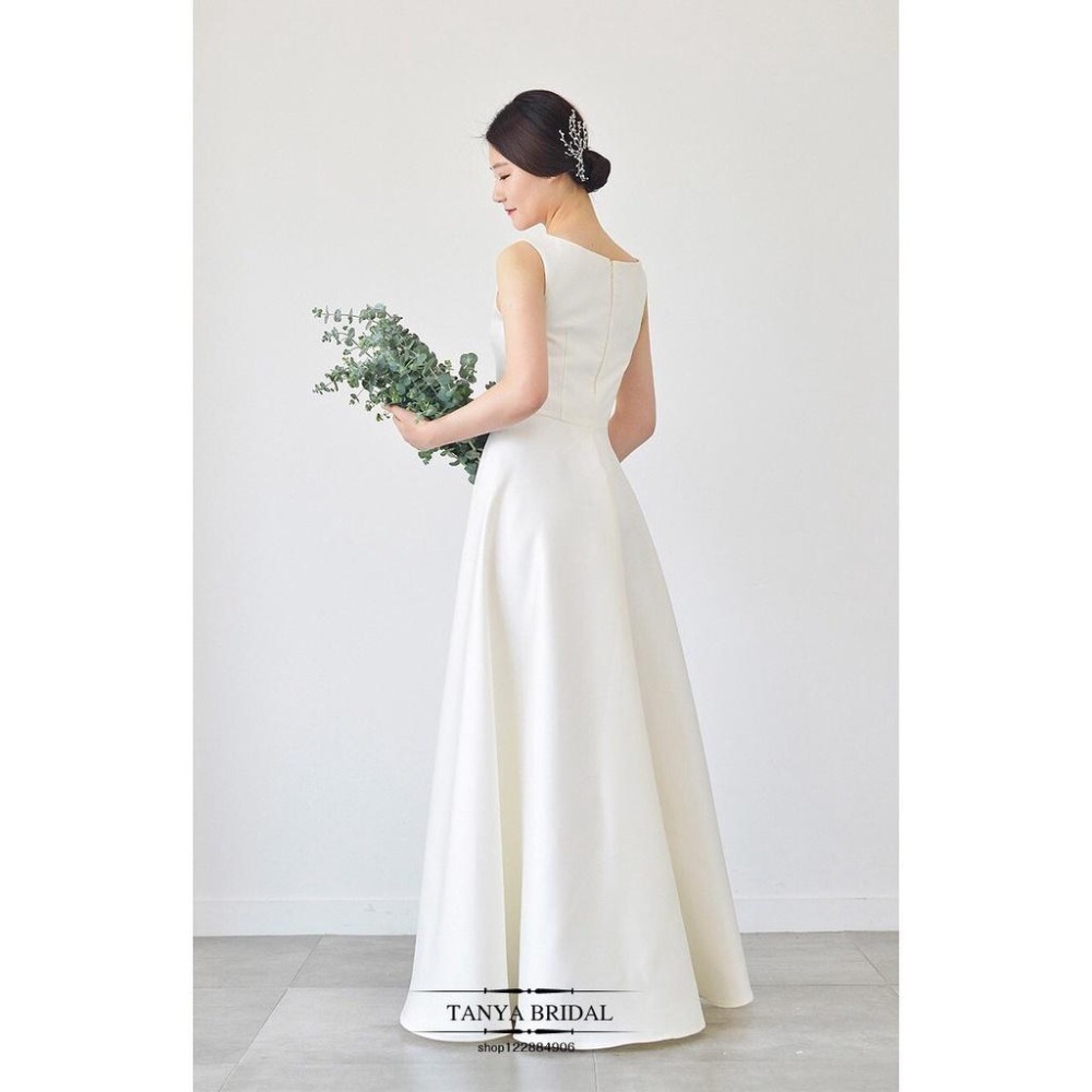 旗艦店緞面輕婚紗2023新款韓式新娘一字肩白色簡約齊地森系婚禮旅拍春季-細節圖8