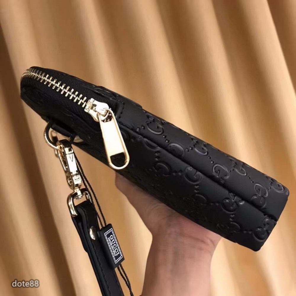 GUCCI古馳高端大氣義大利進口頂級牛皮完美版型男士必備手拿包休閒  逛街 宴會  晚宴  交換禮物  父親節禮物-細節圖4