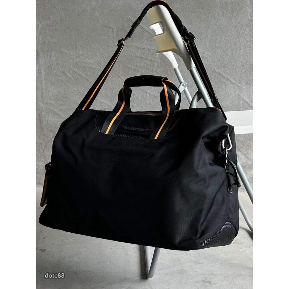 【Tumi】途米McLaren 邁凱輪合作版彈道尼龍搭配碳纖維手提包旅行包單肩包簡約大氣隔層多耐磨簡便實用大容量輕便-細節圖2