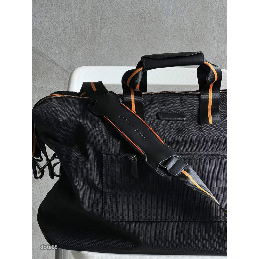 【Tumi】途米McLaren 邁凱輪合作版彈道尼龍搭配碳纖維手提包旅行包單肩包簡約大氣隔層多耐磨簡便實用大容量輕便-細節圖7