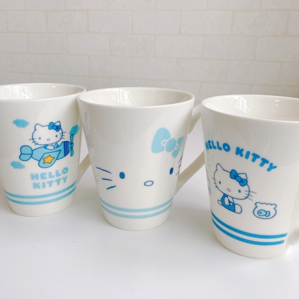 🎈彩虹尾巴🎈KITTY大容量陶瓷水杯 Hello Kitty 50週年 馬克杯 杯子 大臉 飛機 復古水藍系列-細節圖2