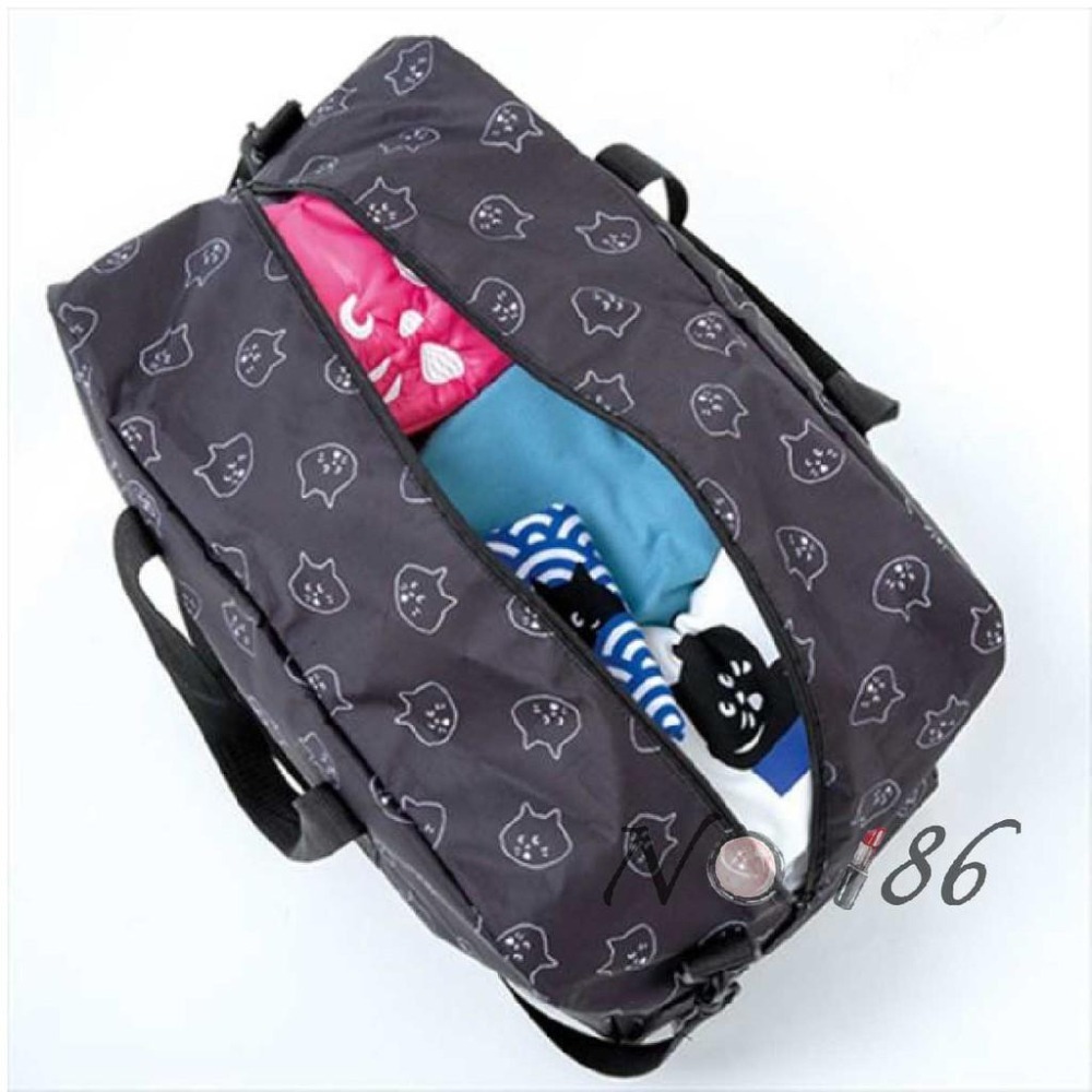 袋我走【NYA 驚訝貓 黑色滿版大旅行袋(只有包沒掛件)】-細節圖5