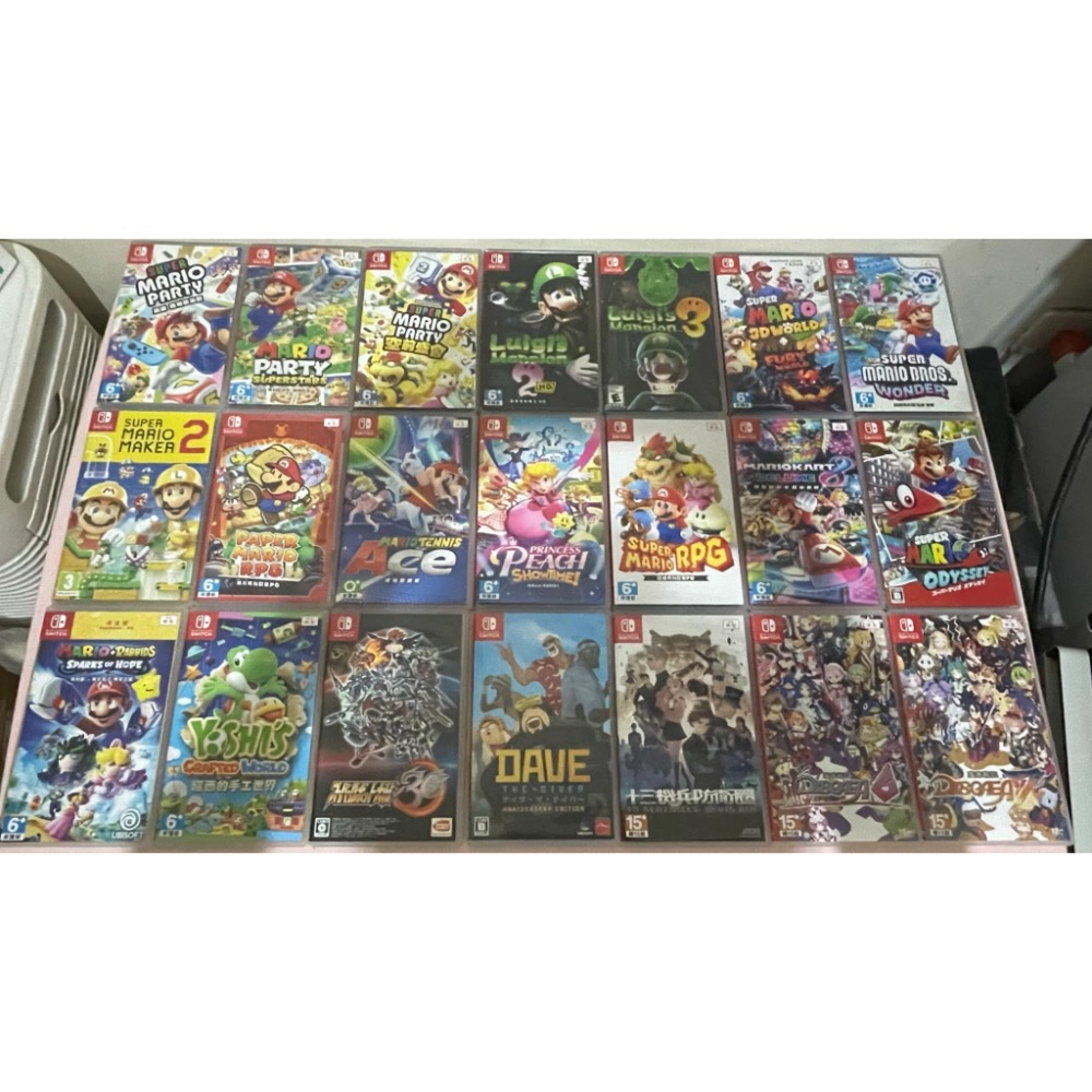 薩爾達那邊是曠野+擴充票、王國、寶可夢紫擴充、動森、霍格華茲、太鼓、瑪利歐是賽車、驚奇、外出包原廠圖案、記憶卡128-細節圖4