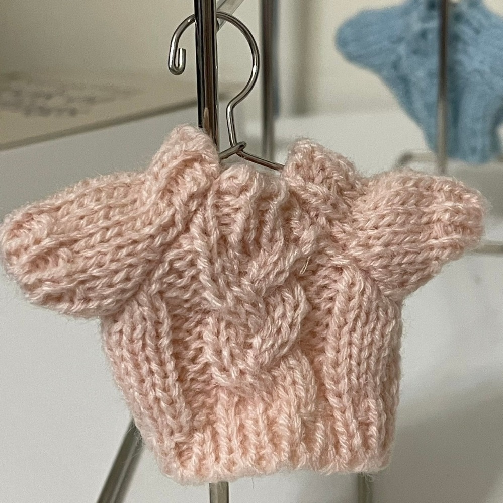 粉色麻花紋毛衣