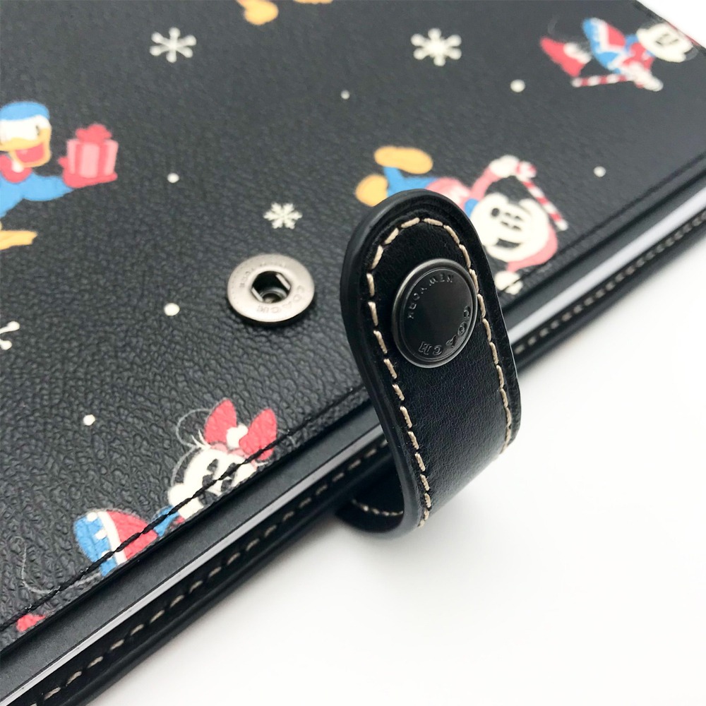 【COACH】x 迪士尼聯名款按釦皮革筆記本-細節圖2