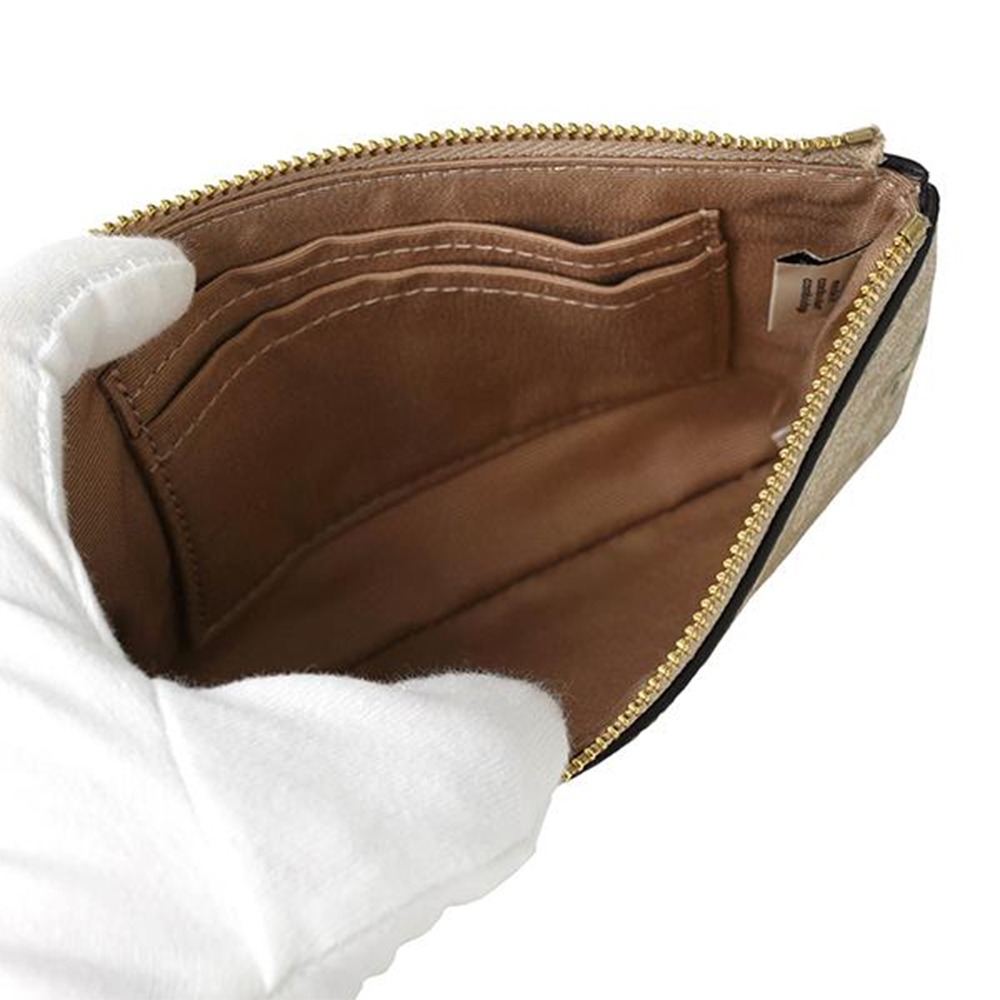 【COACH】印花皮革手拿包-卡其花朵-細節圖4