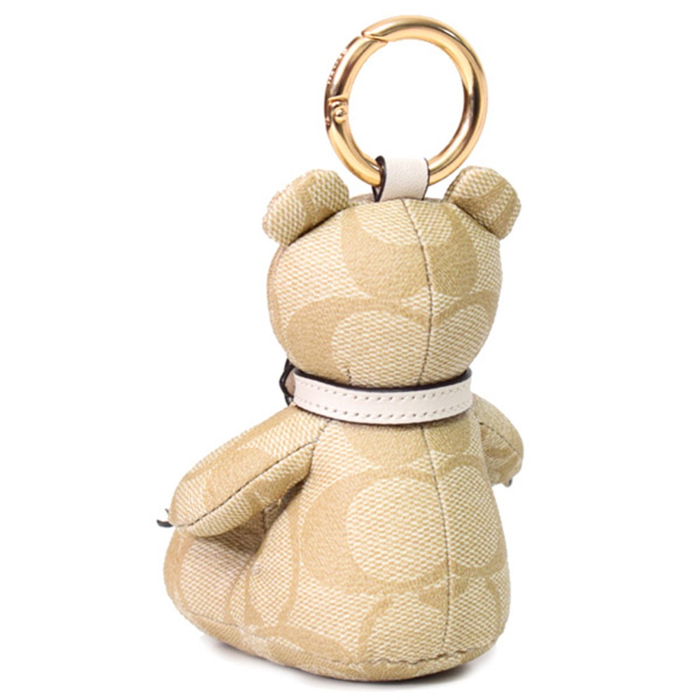 【COACH】經典LOGO皮革小熊坐姿吊飾-淺卡其白-細節圖2