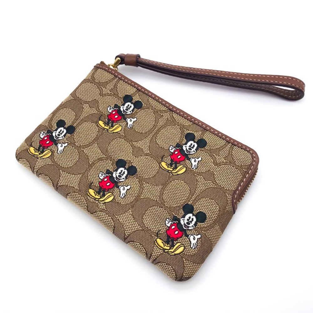 【COACH】印花防刮PVC皮革L型拉鍊手拿包-迪士尼-細節圖2