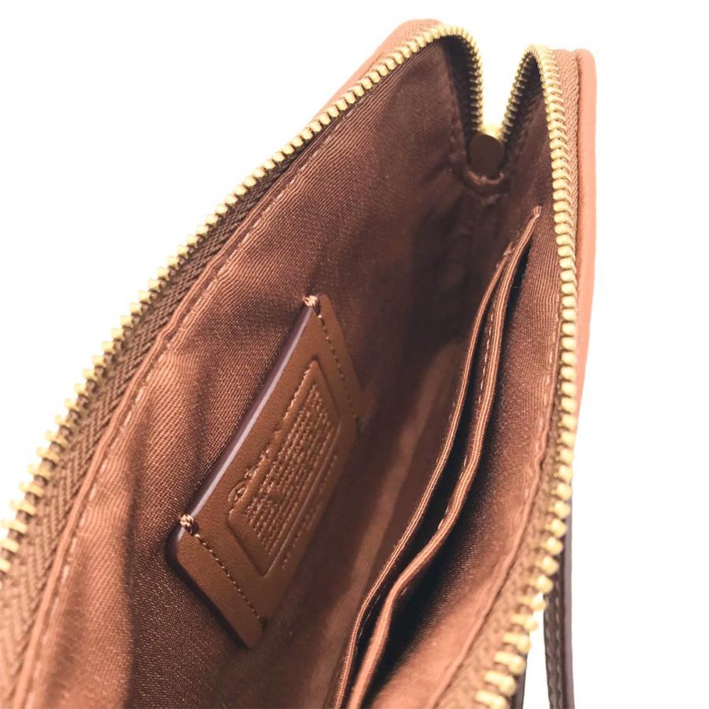 【COACH】印花防刮PVC皮革L型拉鍊手拿包-迪士尼-細節圖4