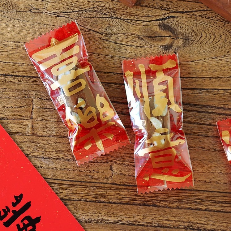 ▪3.7x9cm▪新年迎財納福牛軋糖包裝袋(約100只裝)/奶糖糖果太妃糖烘焙機封袋/新年糖果袋-細節圖4