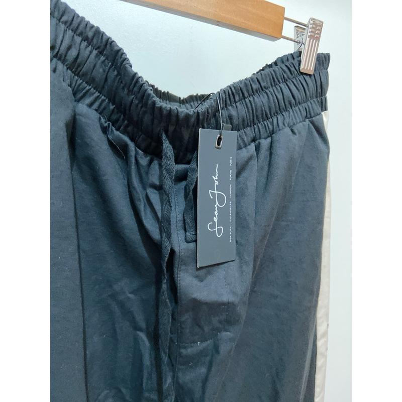 出清！！原價貴！男款 美國品牌潮牌 黑色棉質設計休閒褲運動褲 側邊米白色拼接撞色 下擺鈕釦設計排釦褲 長褲 hiphop-細節圖5