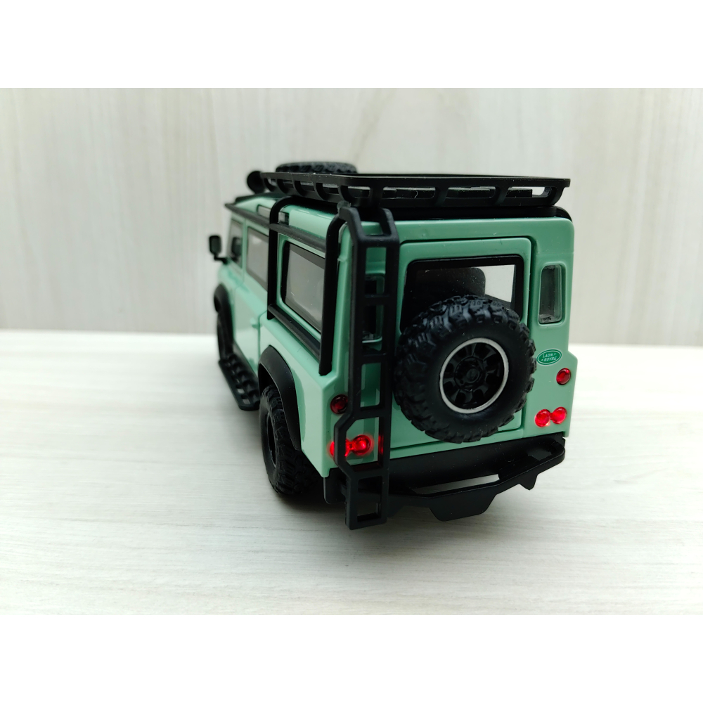 全新盒裝現貨~1:32~路虎衛士 LAND ROVER 越野箱型車 碧綠色 前輪轉向 車燈恆亮開關 合金模型車-細節圖7