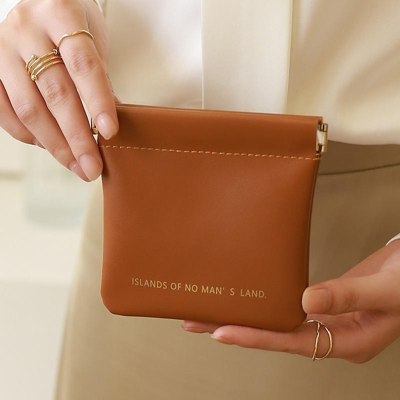 【Helena】彈片收納包 隨身小收納包 彈片收納袋 3c收納包 防水皮革零錢包 衛生棉包 旅行包 包包【D66】-細節圖8