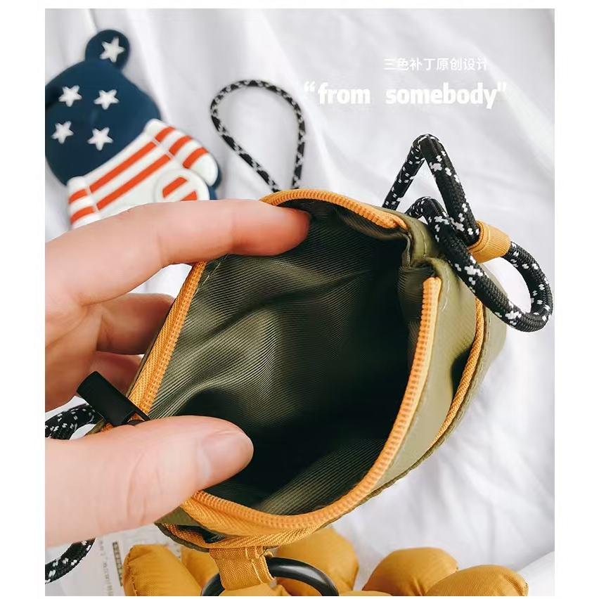 WDF.CO現貨｜2025最新日系太陽花手機包 │ 黑綠橘3色笑臉花朵肩背包｜有拉鍊｜防潑水斜背包｜隨身小包-細節圖8