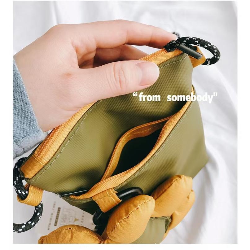 WDF.CO現貨｜2025最新日系太陽花手機包 │ 黑綠橘3色笑臉花朵肩背包｜有拉鍊｜防潑水斜背包｜隨身小包-細節圖9