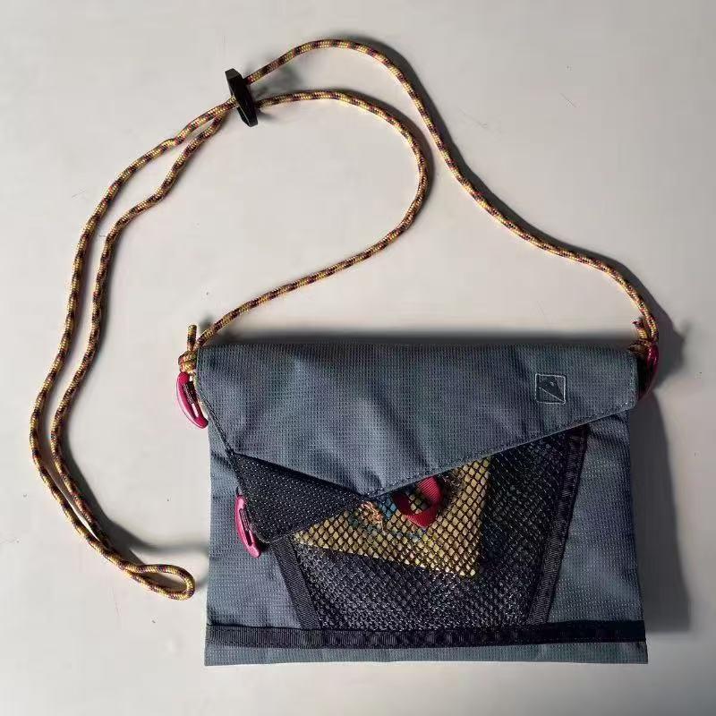 WDF.CO現貨｜2025新款戶外運動尼龍郵差包│黃藍綠黑4色隨身斜背包｜登山小方包｜大容量｜戶外騎行包｜編織繩結肩帶-細節圖3