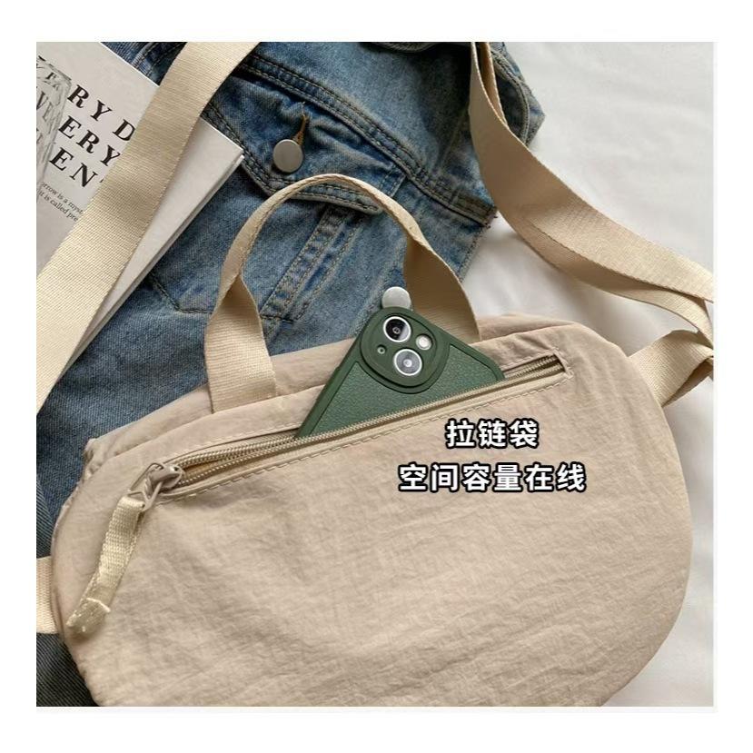 WDF.CO現貨｜2025韓國新款空氣休閒包│黑白藍紅卡綠6色日系斜背包│尼龍布包│大容量│可單肩包｜上課包｜通勤包-細節圖7
