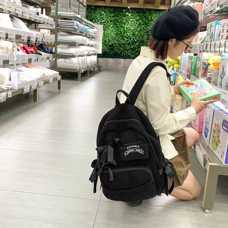 WDF.CO現貨│2025韓國東大門新款蝴蝶結燈芯絨後背包│黑灰白卡4色多口袋大容量雙肩包│有拉鍊│上課雙肩包│旅遊通勤-細節圖7