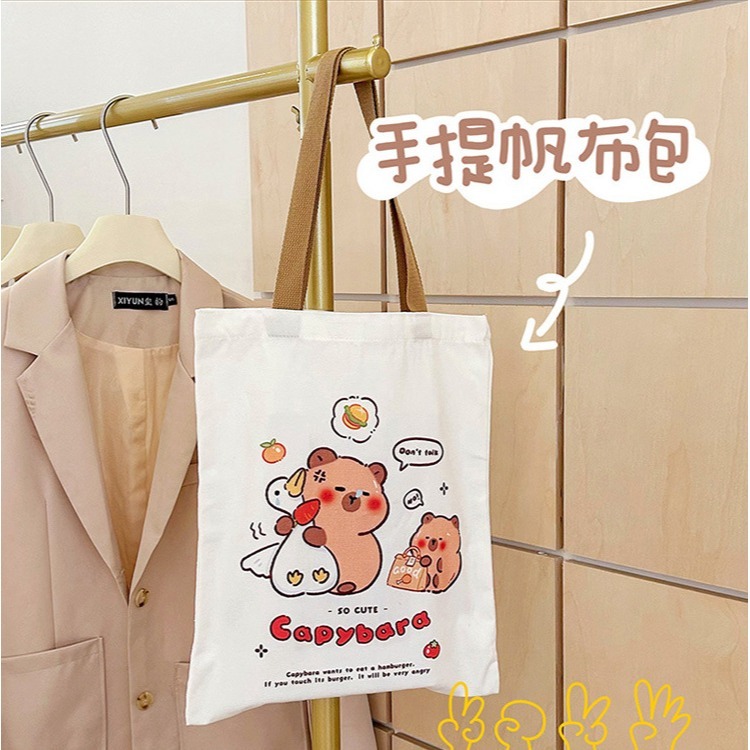 ✨eeshop✨【台灣現貨】可愛水豚君帆布袋 大容量多用途 休閒學生包 單肩手提包 購物袋-細節圖5