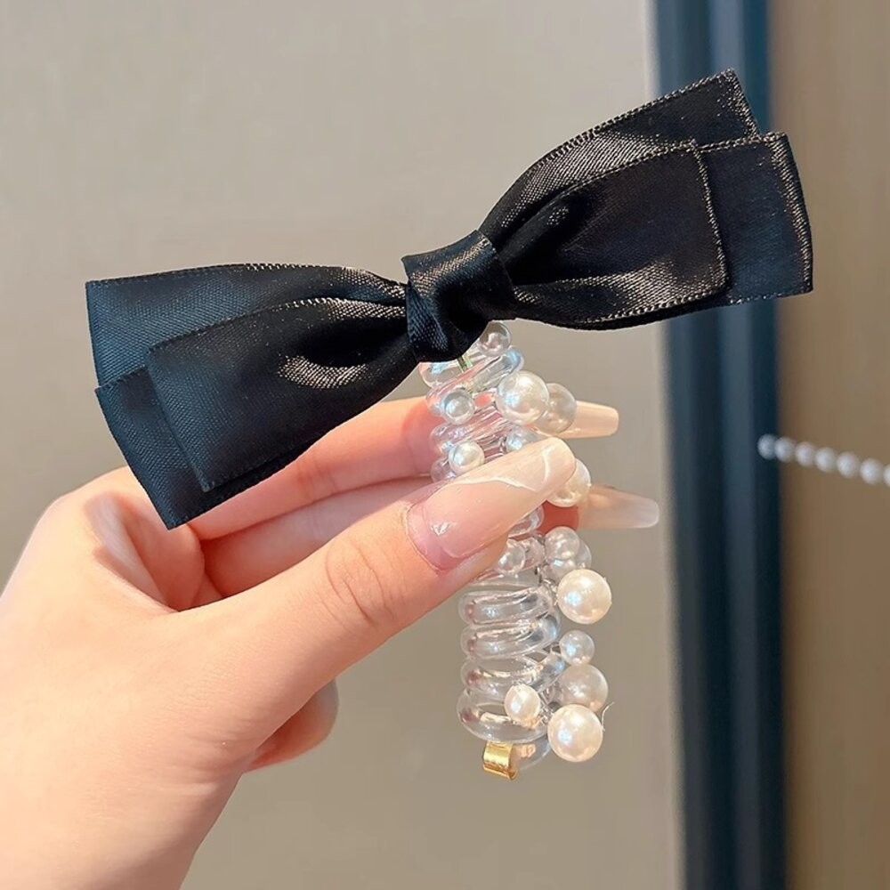 黑色蝴蝶結+白珠