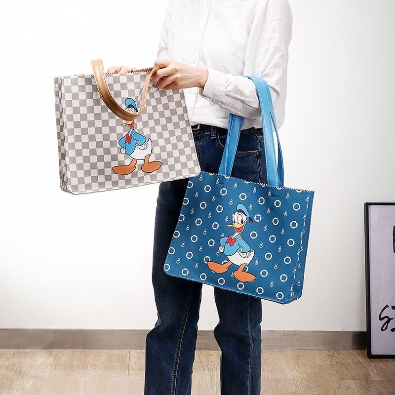正版✨唐老鴨托特包 皮革托特包 人造皮革 迪士尼大容量購物袋單肩包 PVC防水表面（平行輸入代購）-細節圖6