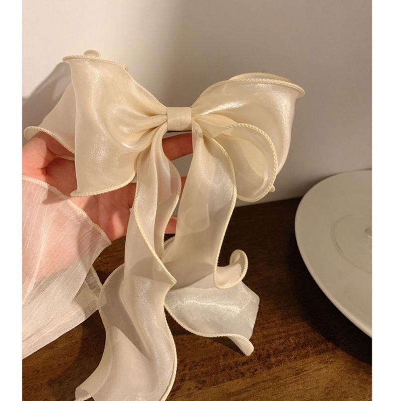 【老闆的娘】高雄現貨 隔日出 韓版超仙人魚姬雪紡超大蝴蝶結彈簧夾 雪白氣質飄帶頭頂夾 頭飾 亮面紡紗 甜美可愛 髮飾-細節圖4