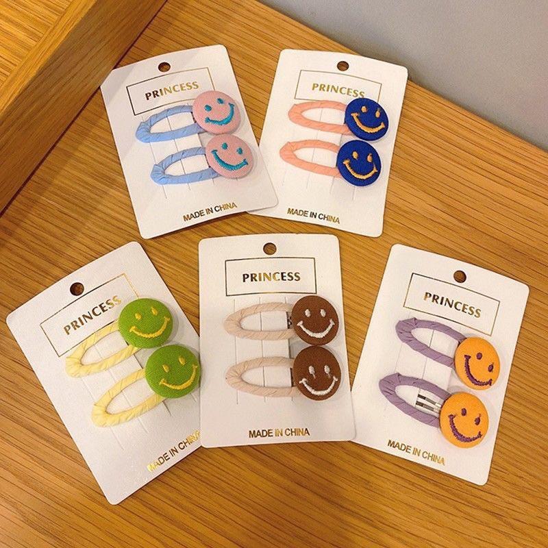 【老闆的娘】高雄現貨 隔日出 兩入裝 可愛刺繡笑臉布藝包邊髮夾 不傷髮 瀏海夾 兒童BB髮夾 彩色微笑 碎髮夾 髮飾-細節圖9