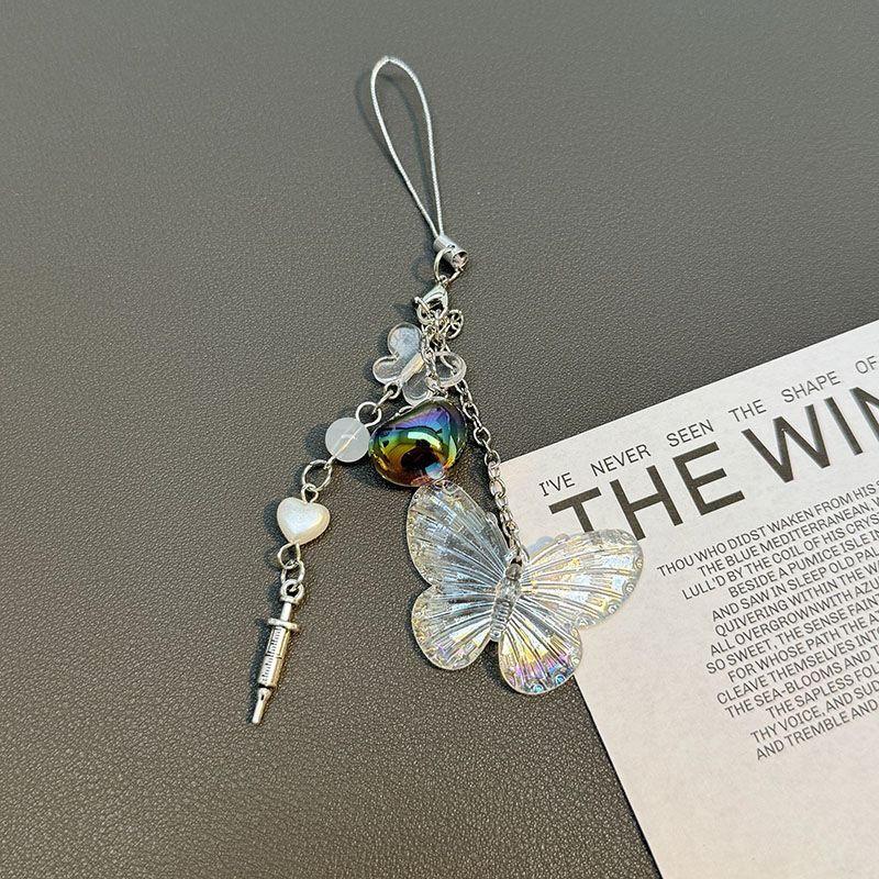 ins甜妹風十字架針筒蝴蝶結掛墜 適用手機殼女高級掛件 ccd相機掛飾 相機掛繩 手機殼掛件 書包掛件 鏈條-細節圖9